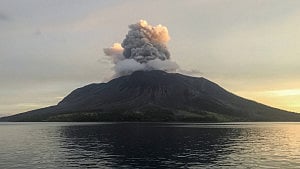 Indonesia volcano erupts, some Bali flights cancelled