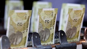 Rupee hits record low