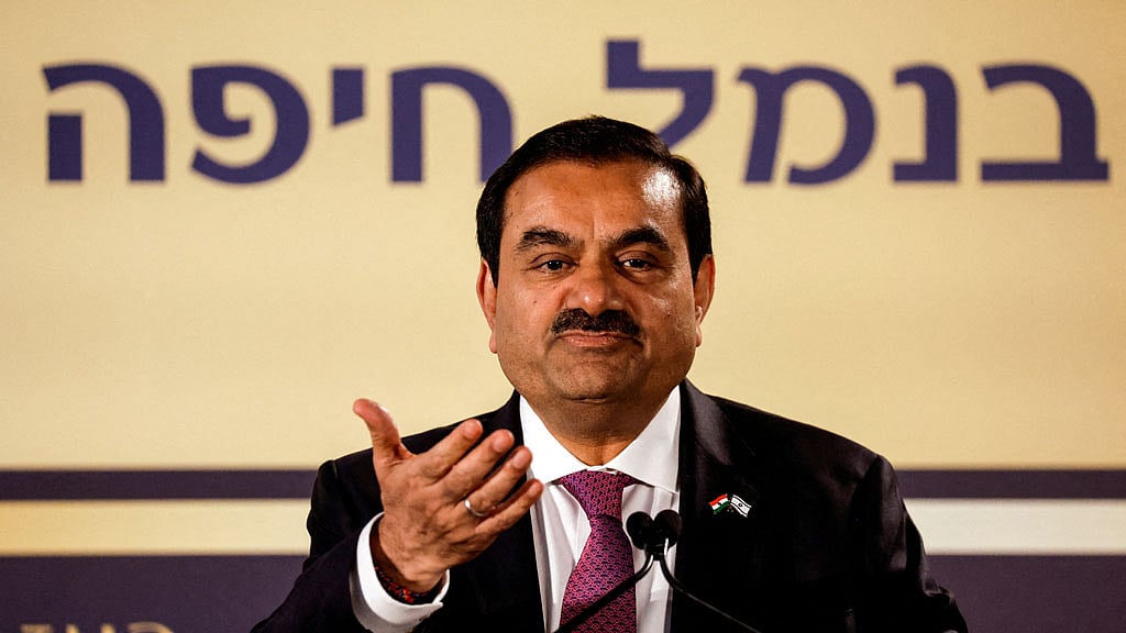 FILE PHOTO: Indian billionaire Gautam Adani speaks during an inauguration ceremony after the Adani Group completed the purchase of Haifa Port earlier in January 2023, in Haifa port, Israel Jan 31, 2023. REUTERS/Amir Cohen/File Photo