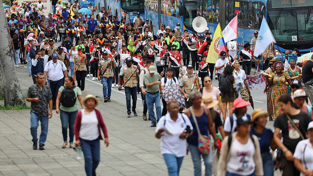 People from different indigenous and Afro-Colombian ethnic groups participate in the parade for life, biodiversity and peace at COP 16, in Cali, Colombia Oct 22, 2024. REUTERS/Luisa Gonzalez