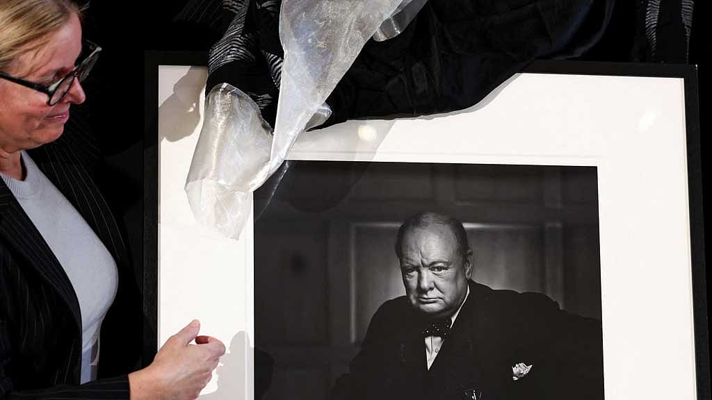 Canadian Cultural Heritage Deputy Minister Isabelle Mondou unveils Yousuf Karsh's 'Roaring Lion' portrait of Churchill, stolen in 2022 from Ottawa’s Fairmont Chateau Laurier and recovered in Italy, during a ceremony at the Canadian Embassy in Rome, Italy, Sept 19, 2024. REUTERS/Yara Nardi