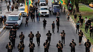 Iran-backed militias in Iraq ready to disarm to avert Trump wrath
