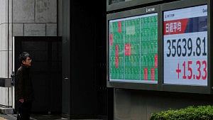 Shares bruised, dollar crumbles on recession fears