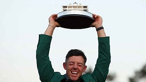 Rory McIlroy wins The Masters, completes Grand Slam