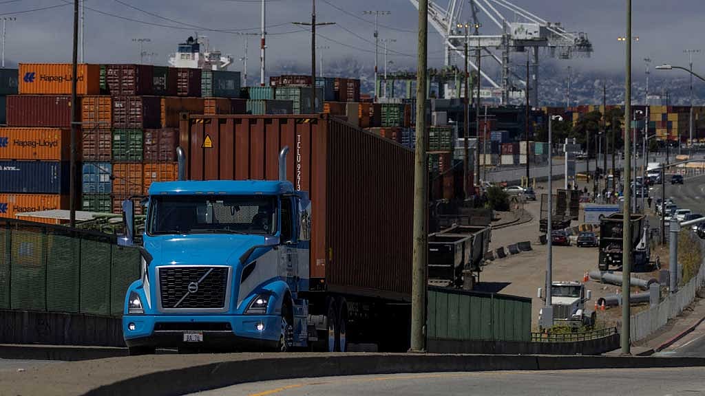 FILE PHOTO: Shipping containers are seen at a terminal inside the Port of Oakland as truck drivers continue protesting against California's new law known as AB5, in Oakland, California, US, Jul 21, 2022. REUTERS/Carlos Barria/File Photo