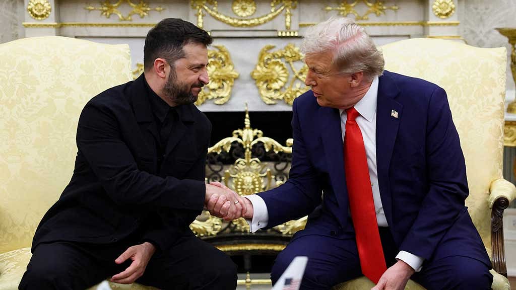US President Donald Trump and Ukrainian President Volodymyr Zelensky shake hands as they meet at the Oval Office of the White House, amid negotiations to end the Russian war in Ukraine, in Washington, DC, US, Aug 18, 2025. REUTERS/Kevin Lamarque