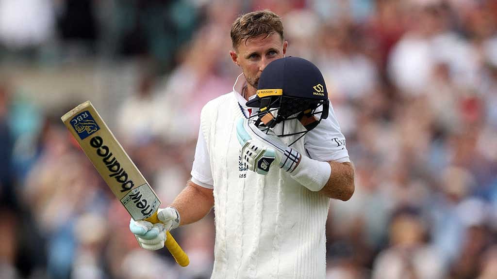 Fifth Test - England v India - Kia Oval, London, Britain - Aug 3, 2025 England's Joe Root kisses his helmet as he celebrates after reaching his century Action Images via Reuters/Paul Childs