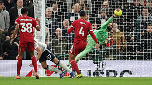 Liverpool survive Spurs scare