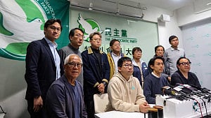 Hong Kong's last opposition party votes to disband