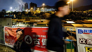 Hong Kong election turnout in focus amid anger over fire