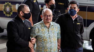 Malaysia charges PM's former aide with receiving bribes