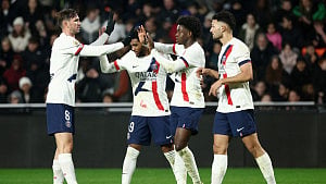 PSG survive scare to move top
