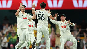 Starc shines with bat, ball as Australia near Gabba win