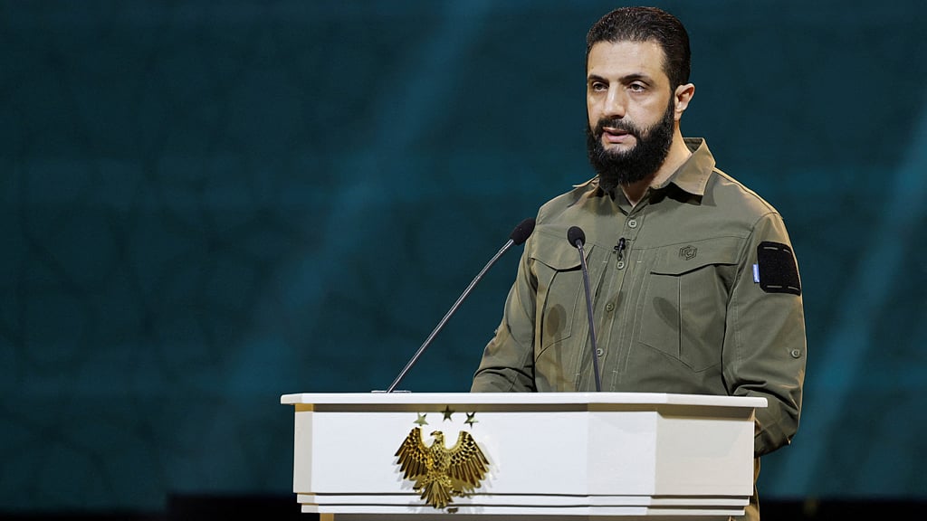 Syria's President Ahmed al-Sharaa delivers a speech on the first anniversary of Bashar al-Assad's fall, in Damascus, Syria Dec 8, 2025. REUTERS