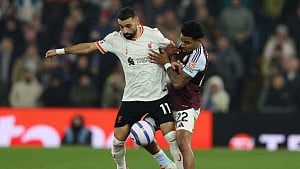 Liverpool held by Villa but go 8 points clear