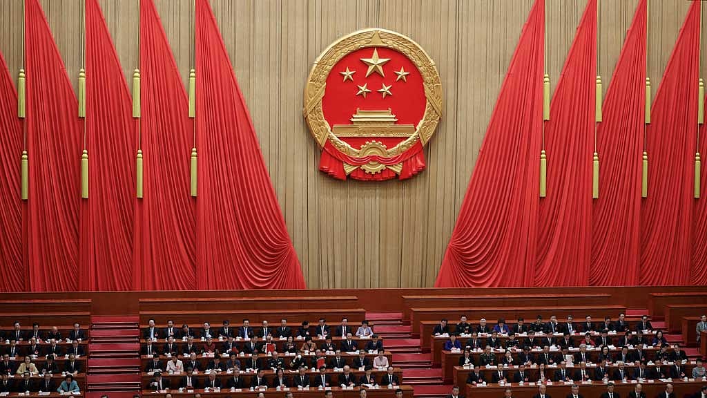 FILE PHOTO: Chinese President Xi Jinping and other leaders attend the closing session of the National People's Congress (NPC) at the Great Hall of the People in Beijing, China Mar 11, 2024. REUTERS/Tingshu Wang/File Photo