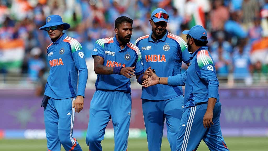 ICC Men's Champions Trophy - Group A - India v Pakistan - Dubai International Stadium, Dubai, United Arab Emirates - February 23, 2025 India's Hardik Pandya celebrates after taking the wicket of Pakistan's Saud Shakeel. REUTERS/Satish Kumar