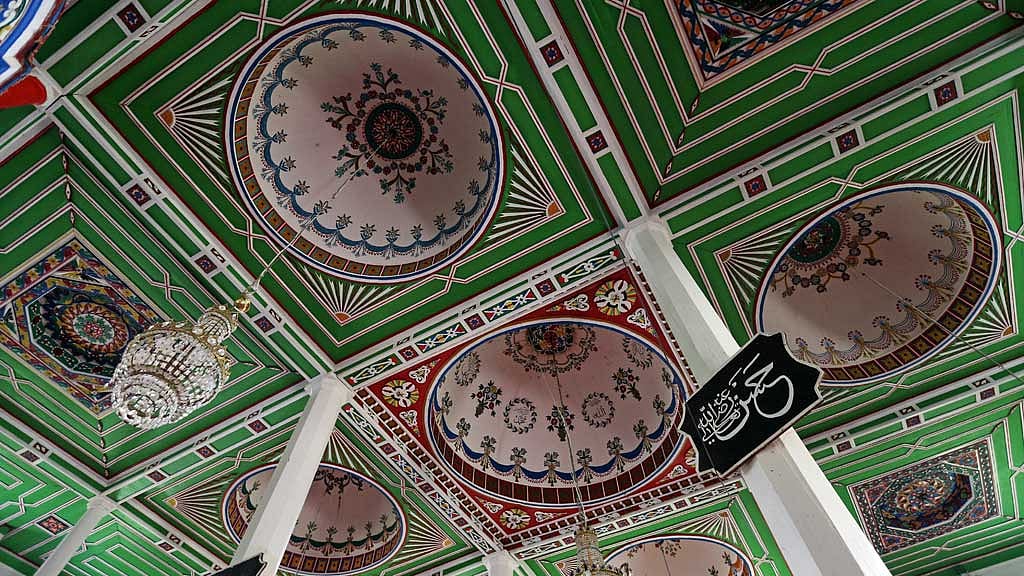 A view shows the painted ceiling of a wooden mosque on the first day of the Muslim holiday of Kurban Bayram, also known as Eid al-Adha, in the village of Ghorjomi, Georgia June 6, 2025. REUTERS