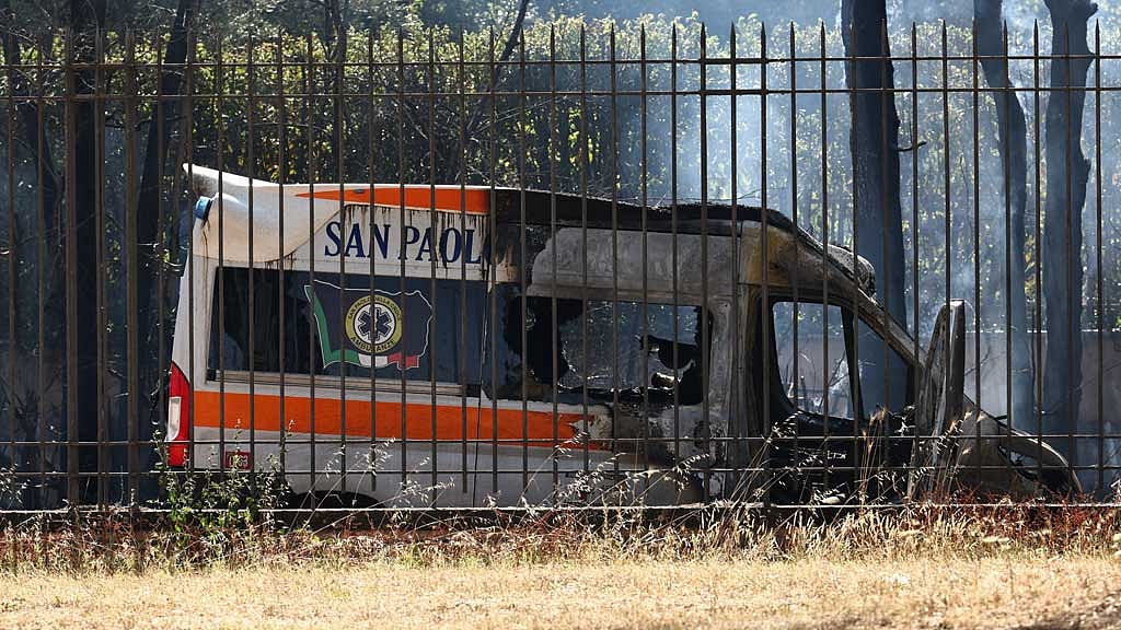 A burnt ambulance is seen after a gas station exploded on the outskirts of Rome, Italy, Jul 4, 2025. REUTERS/Matteo Minnella