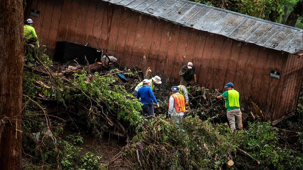 Volunteers search for flood victims after deadly flooding in Kerr County, Texas, US, Jul 6, 2025. REUTERS/Sergio Flores