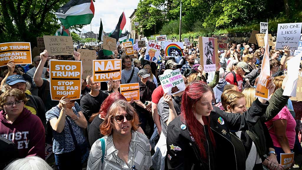 Anti-Trump demonstrators gather during a rally organised by the campaign group Stop Trump Coalition, protesting the visit of US President Donald Trump, in Edinburgh, Scotland, Britain, July 26, 2025. REUTERS