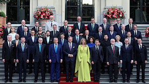 NATO commits to higher spending sought by Trump