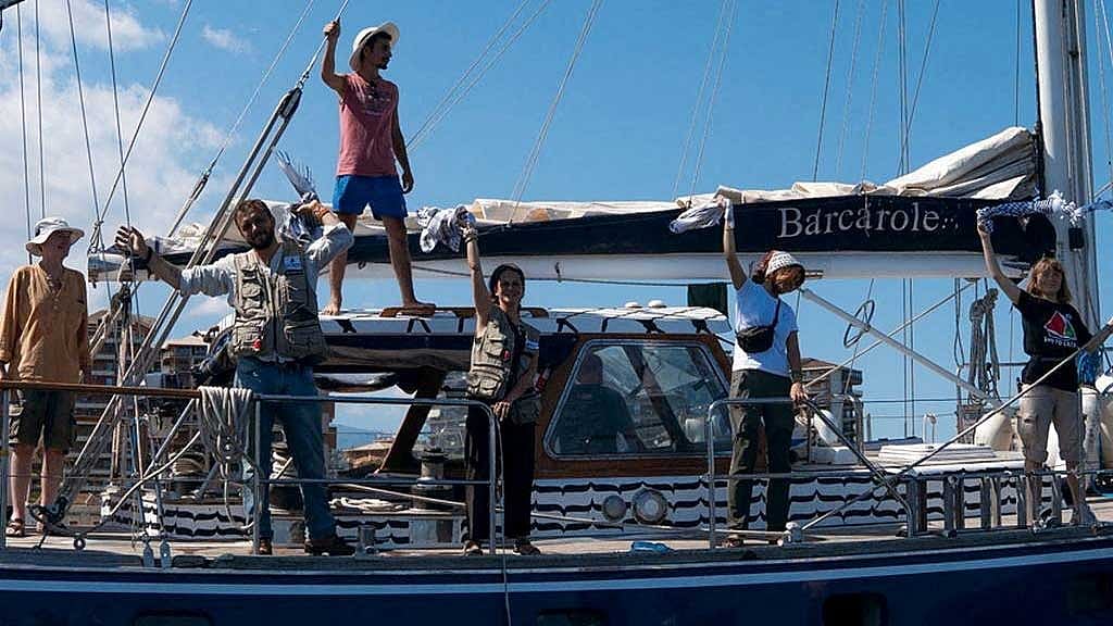 FILE PHOTO: Activist Greta Thunberg and crew stand aboard the aid ship Madleen, which left the Italian port of Catania on Jun 1 to travel to Gaza to deliver humanitarian aid, in this picture released on Jun 2, 2025 on social media. Freedom Flotilla Coalition/via REUTERS/File Photo