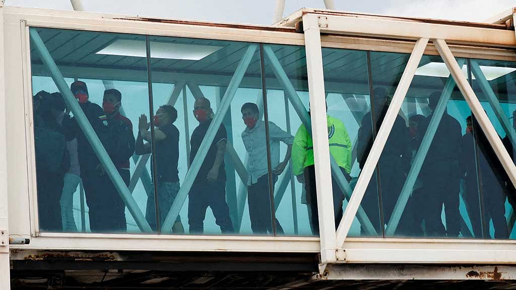 Venezuelan migrants arrive after being deported from the United States, at Simon Bolivar International Airport, in Maiquetia, Venezuela April 23, 2025. REUTERS