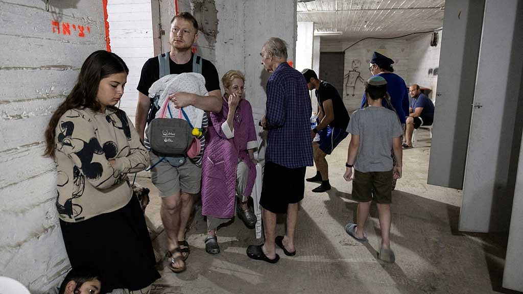 Israelis gather in a shelter following sirens in Tel Aviv, Israel Jun 13, 2025 REUTERS/Itay Cohen