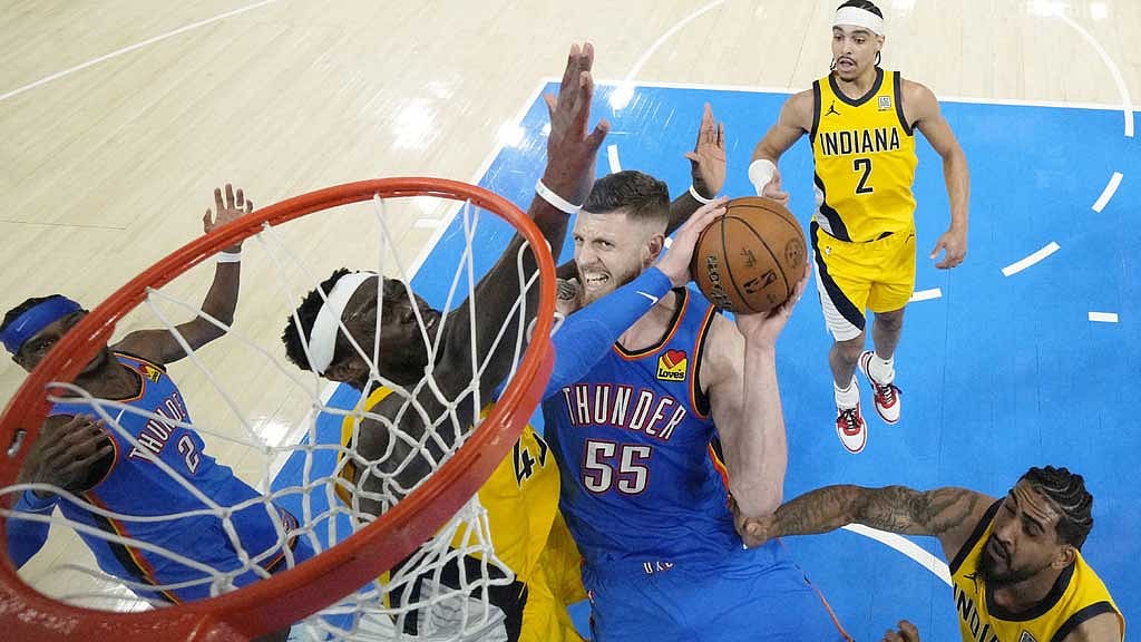 Jun 22, 2025; Oklahoma City, Oklahoma, USA; Oklahoma City Thunder center Isaiah Hartenstein (55) drives to the basket against Indiana Pacers forward Pascal Siakam (43) during the first half of game seven of the 2025 NBA Finals at Paycom Center. Mandatory Credit: Kyle Terada-Imagn Images