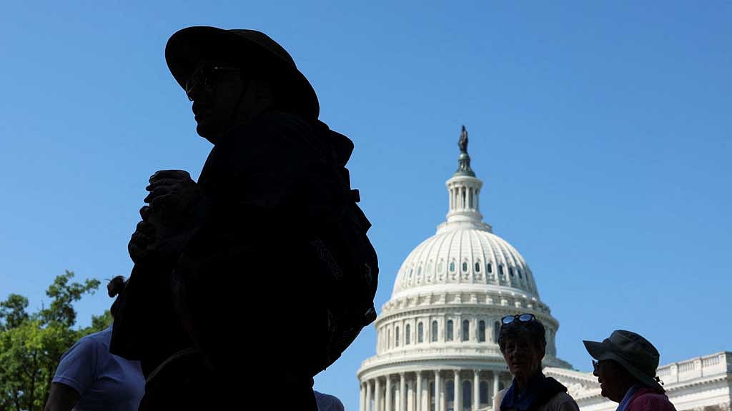 People gather for a "Sisters Speak Out" rally of Catholic nuns in opposition to US President Donald Trump's sweeping tax-cut and spending bill pending in the Senate, on Capitol Hill in Washington, DC, US, Jun 24, 2025. REUTERS/Kevin Mohatt