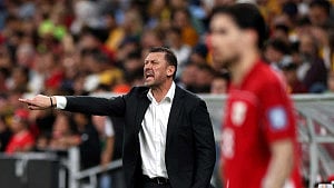Australia beat China to tighten hold on WC qualifying berth