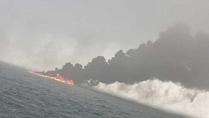 Tanker hired by US military ablaze off UK