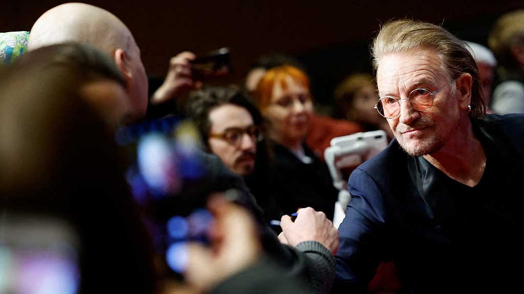 Bono, lead singer of Irish band U2 arrives to attend the screening of the documentary movie 'Kiss the Future' at the 73rd Berlinale International Film Festival in Berlin, Germany, Feb 19, 2023. REUTERS/Michele Tantussi 