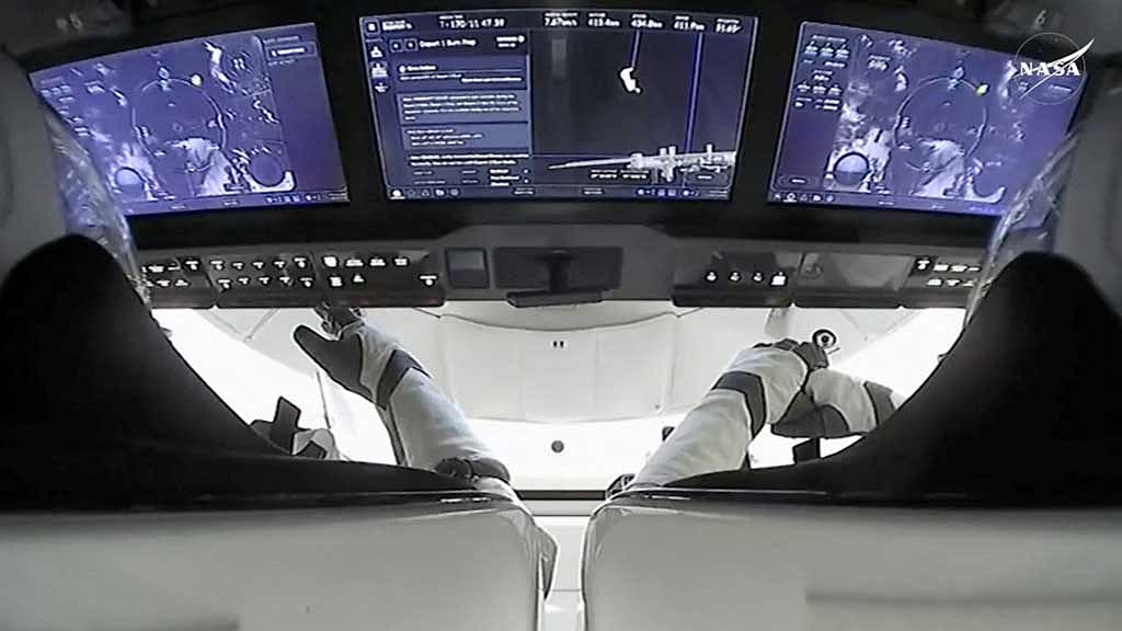 Astronauts are seen inside a SpaceX Crew Dragon capsule carrying Butch Wilmore and Suni Williams, two veteran NASA astronauts who have been stuck on the International Space Station for nine months, and Roscosmos cosmonaut Aleksandr Gorbunov and NASA astronaut Nick Hague, after the capsule undocked from the ISS to begin a journey to return to Earth Mar 18, 2025 in this still image taken from video. NASA/Handout via REUTERS