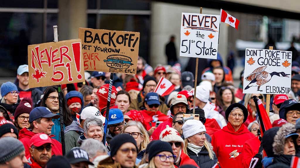 Canadians hold an "Elbows Up" protest against US tariffs and other policies by US President Donald Trump, at Nathan Phillips Square in Toronto, Ontario, Canada Mar 22, 2025. REUTERS/Carlos Osorio