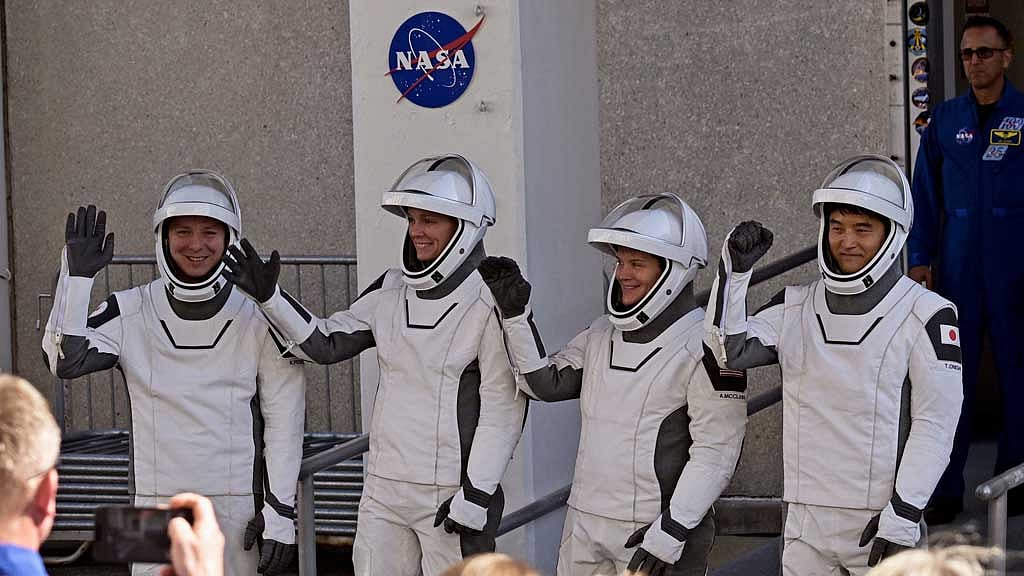 NASA's SpaceX Crew-10 Cosmonaut Mission Specialist Kirill Peskov of Roscosmos of Russia, Pilot Nichole Ayers and Commander Anne McClain of U.S. and Mission Specialist Takuya Onishi of Japan's JAXA, walk from the Operations & Checkout Building at the Kennedy Space Center for transport to Launch Complex 39-A ahead of their launch to the International Space Station in Cape Canaveral, Florida, US, March 12, 2025. REUTERS