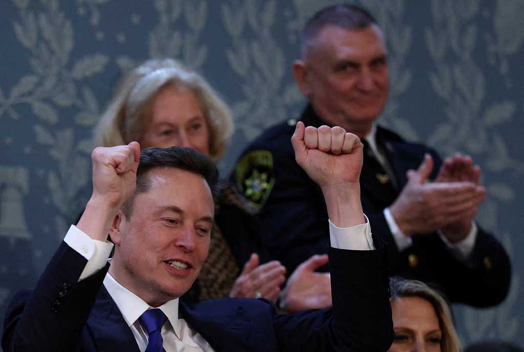 Elon Musk reacts on the day of US President Donald Trump's speech to a joint session of Congress, in the House Chamber of the US Capitol in Washington, DC, Mar 4, 2025. REUTERS