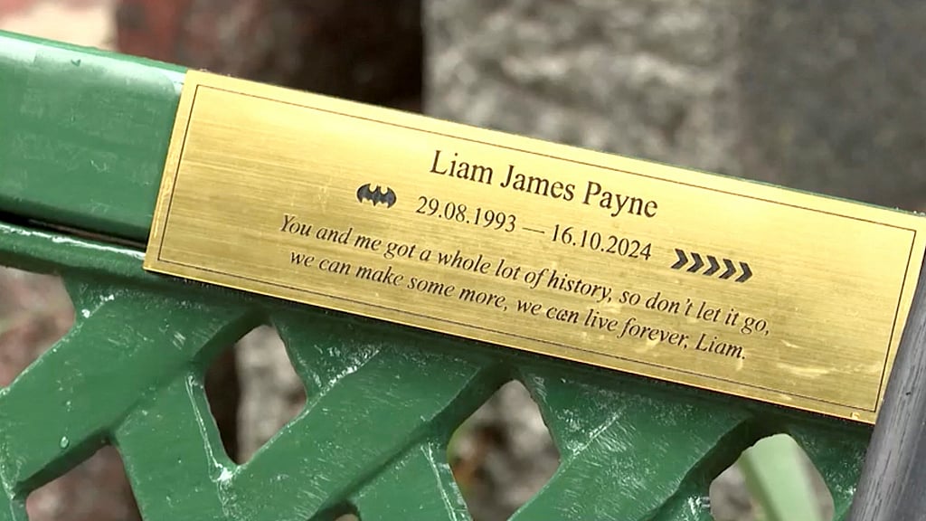 A plate with a tribute message to late British singer Liam Payne is seen on a bench unveiled by 'One Direction' fans at the British Cemetery in Buenos Aires, Argentina Mar 16, 2025, in this screen grab from video. REUTERS/Reuters TV