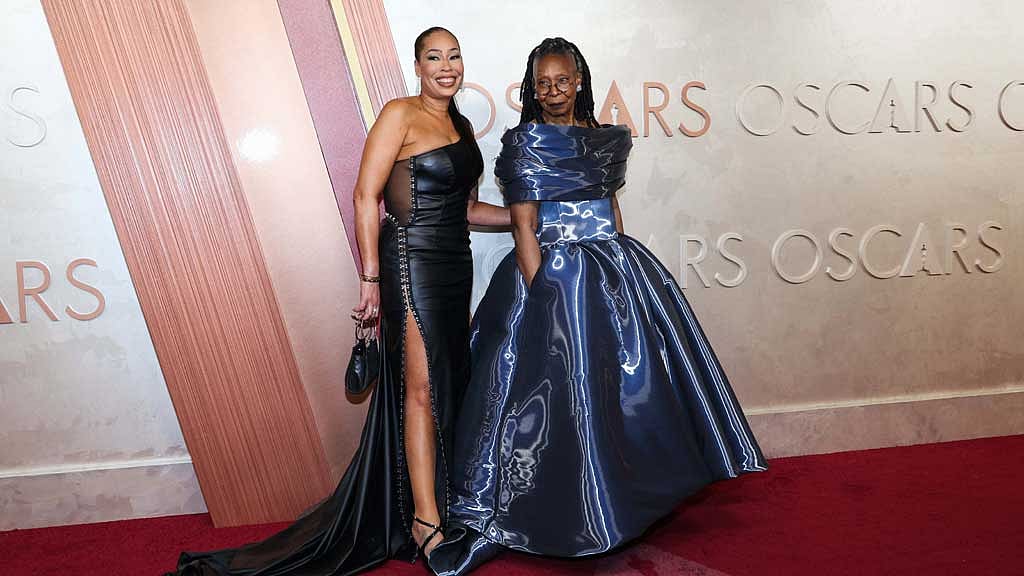 Whoopi Goldberg and Alex Martin Dean pose on the red carpet during the Oscars arrivals at the 97th Academy Awards in Hollywood, Los Angeles, California, US, March 2, 2025. REUTERS