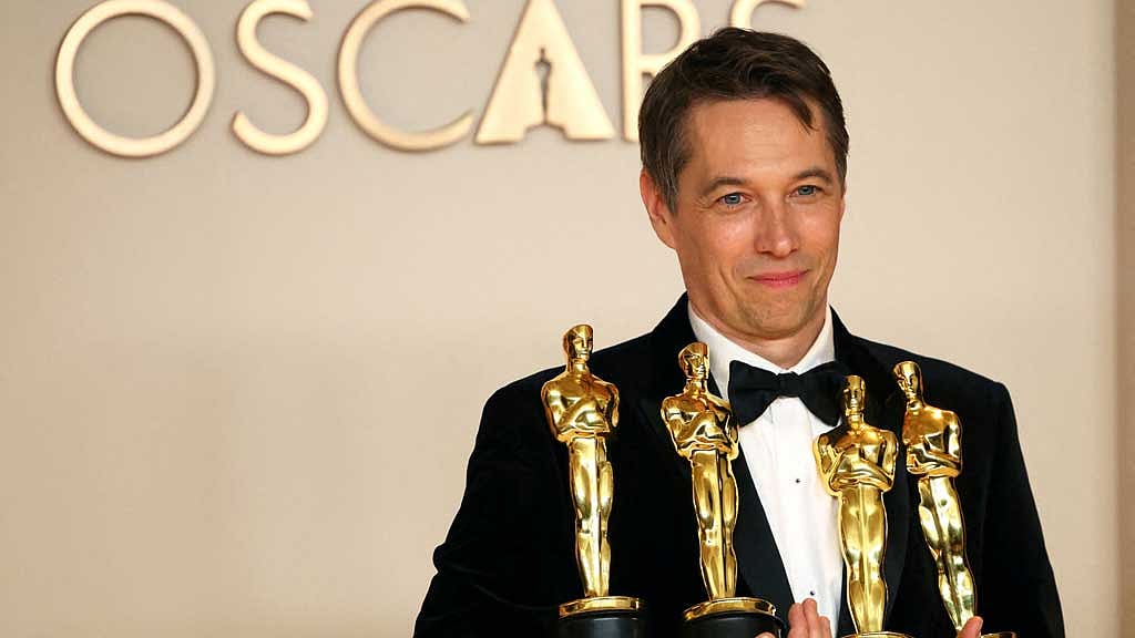 Director Sean Baker holds the Oscars for Best Picture, Best Director, Best Film Editing and Best Original Screenplay for "Anora" , in the Oscars photo room at the 97th Academy Awards in Hollywood, Los Angeles, California, US, Mar 2, 2025. REUTERS/Daniel Cole