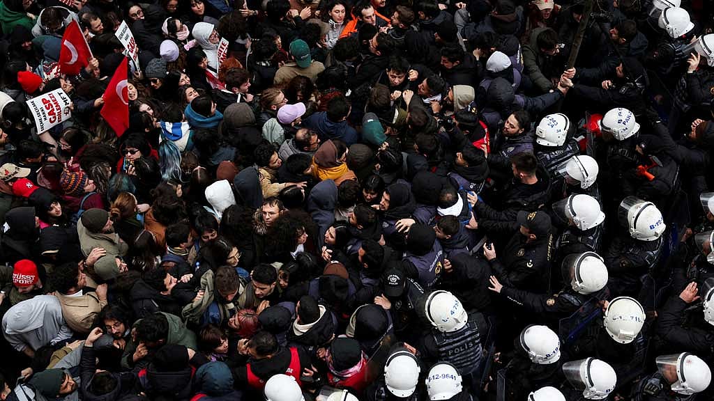 Police officers gather as university students take part in a protest against the detention of Istanbul Mayor Ekrem Imamoglu, in Istanbul, Turkey, Mar 20, 2025. REUTERS/Umit Bektas
