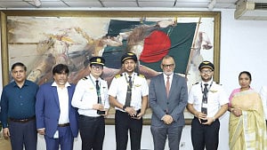 Govt honours captain, crew of Biman flight that lost wheel