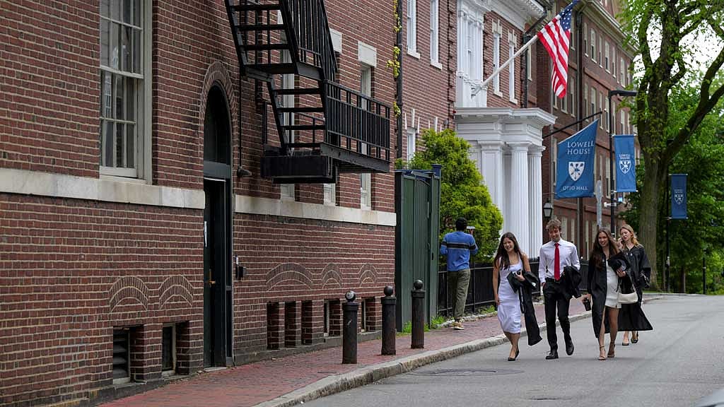 Students walk on the campus of Harvard University in Cambridge, Massachusetts, US, May 23, 2025. REUTERS