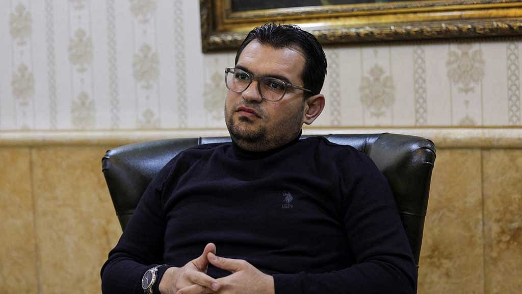 Syrian trader Mohammad al-Badawi speaks during an interview with Reuters, in Idlib, Syria March 17, 2025. REUTERS