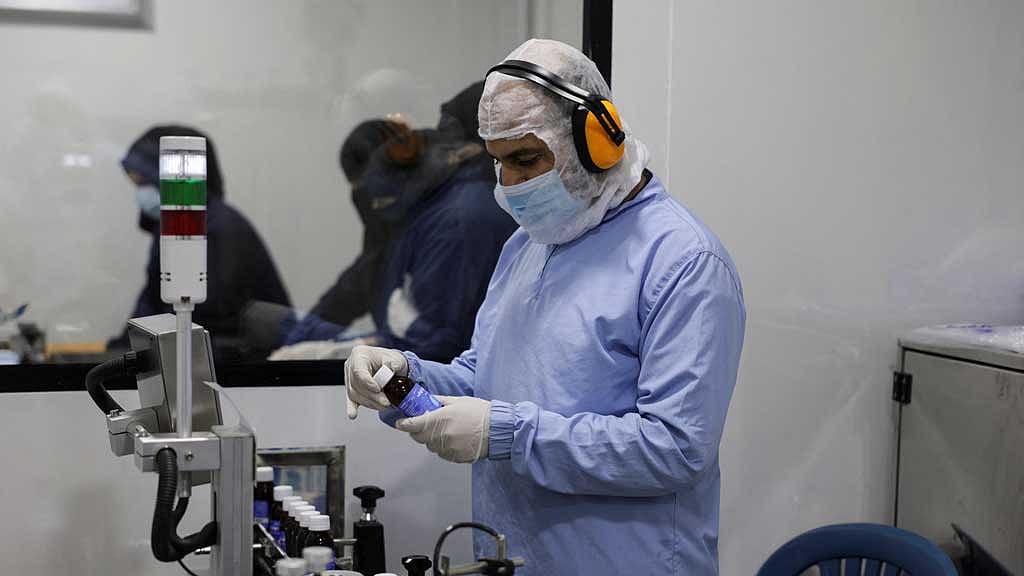 A worker supervises the manufacturing of medicines inside Reva Pharma factory in Sarmada, Idlib, Syria March 17, 2025. REUTERS