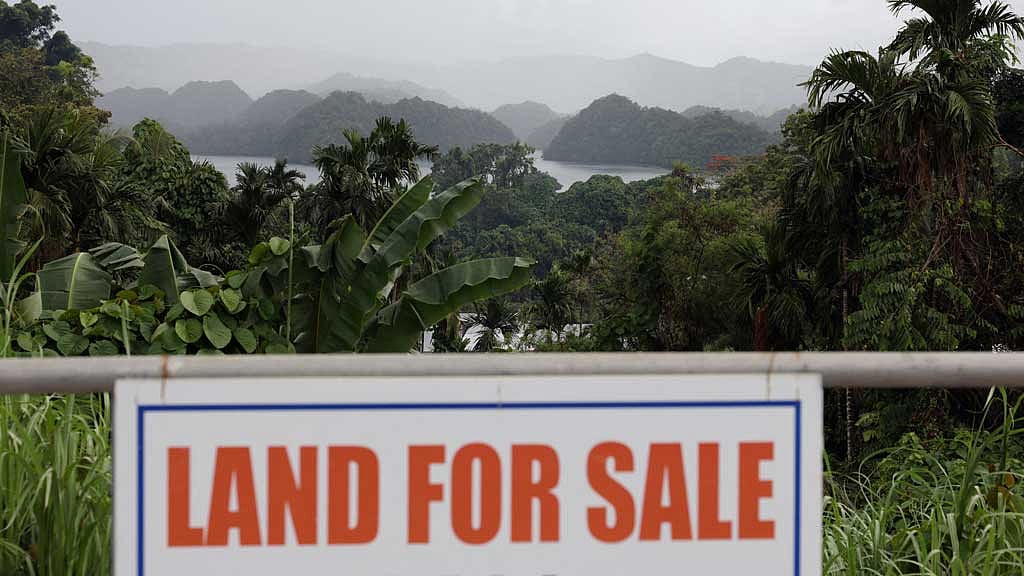 A ‘Land For Sale’ sign overlooking Nikko Bay in Koror, Palau, April 12, 2025. REUTERS