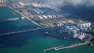 Oil prices edge down