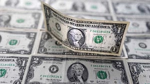 Dollar slumps on worries of what US data fog might show