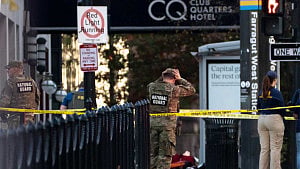 FBI probes gunman's motive in Guardsmen shooting
